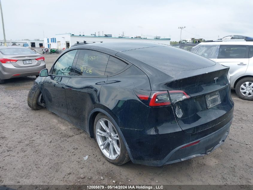 2023 Tesla Model Y VIN: LRWYGDFD2PC967246 Lot: 12005879