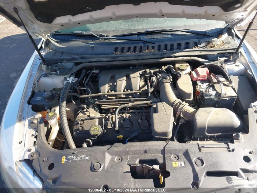 2014 Ford Taurus Sel VIN: 1FAHP2H80EG180427 Lot: 12006482