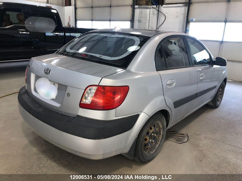 2009 Kia Rio VIN: KNADE223096471868 Lot: 12006531