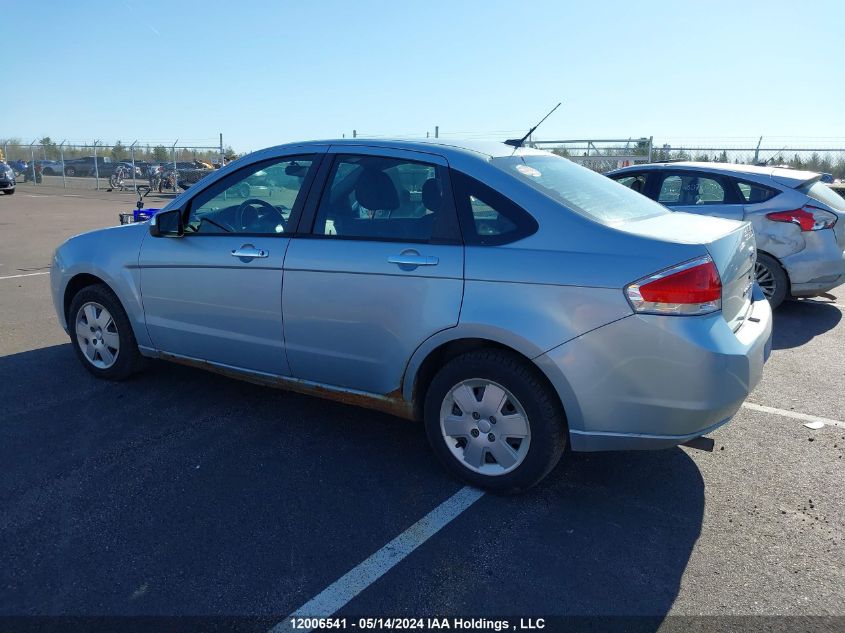 2009 Ford Focus VIN: 1FAHP35N39W256492 Lot: 12006541