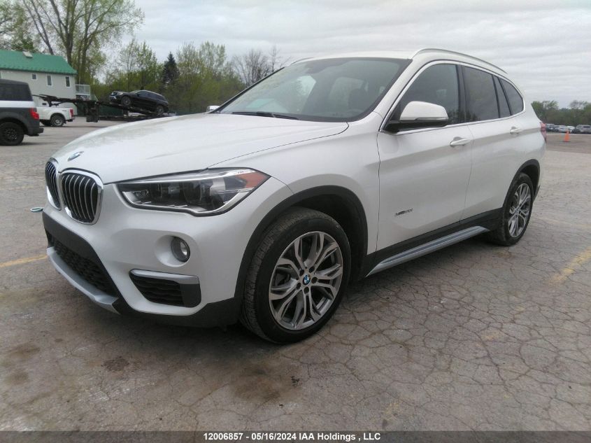 2018 BMW X1 VIN: WBXHT3C30J5F90695 Lot: 12006857