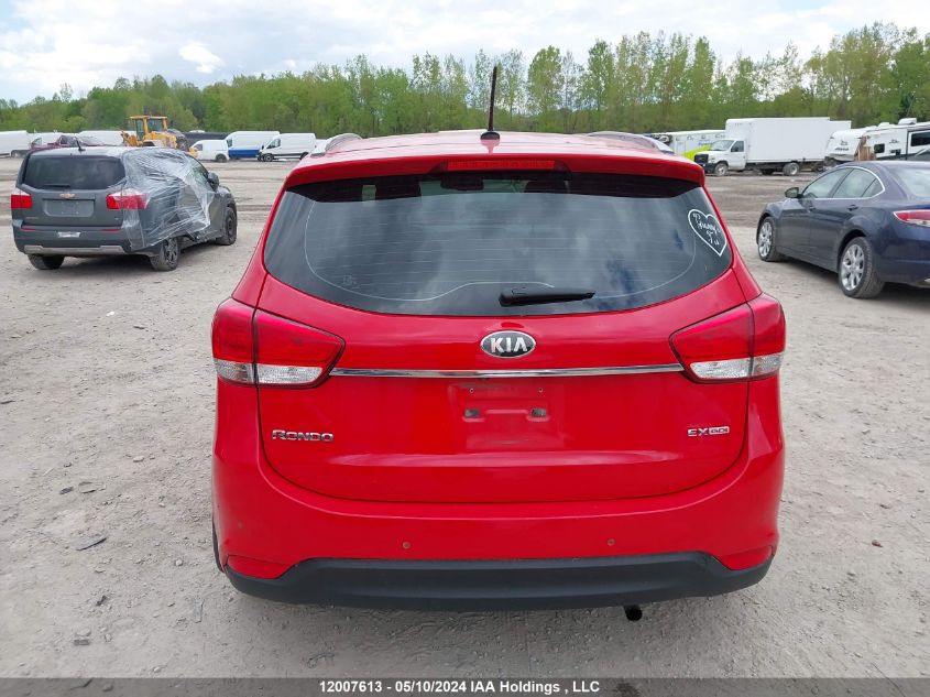 2014 Kia Rondo VIN: KNAHU8A31E7061111 Lot: 12007613