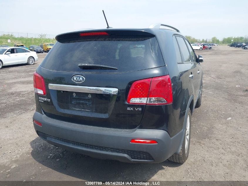 2011 Kia Sorento Ex VIN: 5XYKUDA2XBG069134 Lot: 12007789