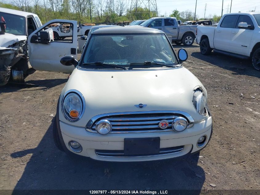2010 Mini Cooper Hardtop VIN: WMWMF3C53ATZ62380 Lot: 12007977