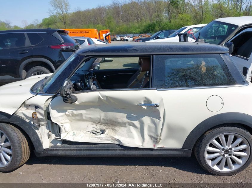 2010 Mini Cooper Hardtop VIN: WMWMF3C53ATZ62380 Lot: 12007977
