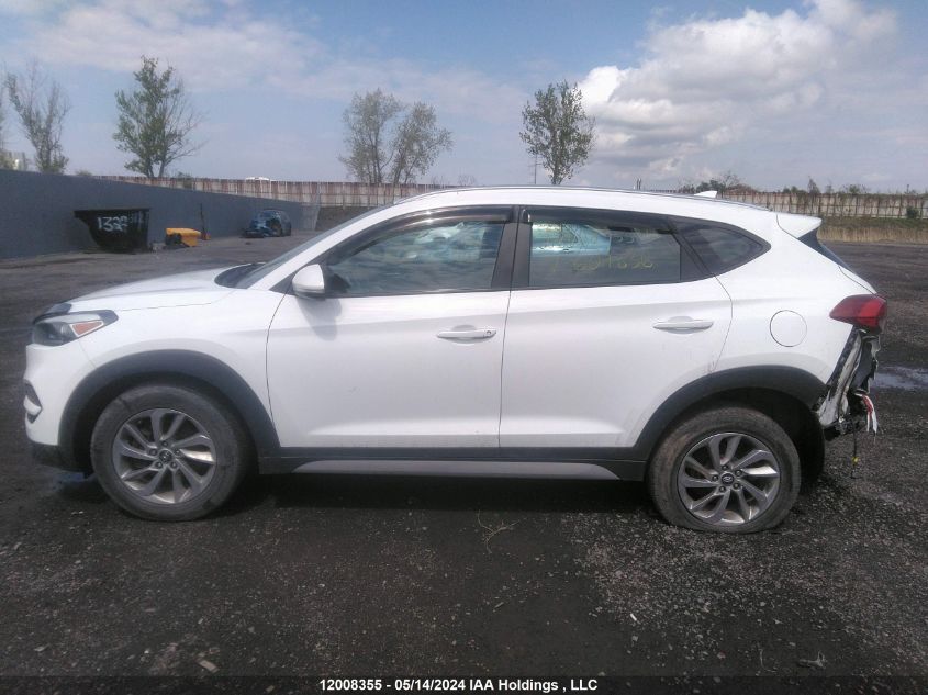 2018 Hyundai Tucson Premium 2.0L VIN: KM8J33A44JU607636 Lot: 12008355