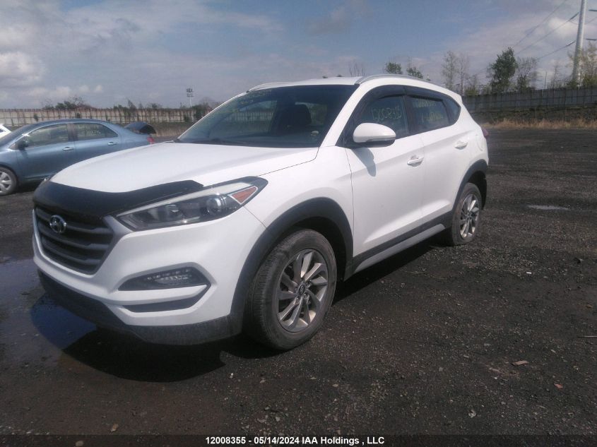 2018 Hyundai Tucson Premium 2.0L VIN: KM8J33A44JU607636 Lot: 12008355