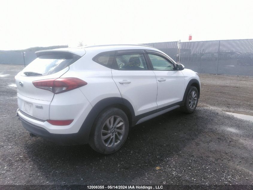 2018 Hyundai Tucson Premium 2.0L VIN: KM8J33A44JU607636 Lot: 12008355