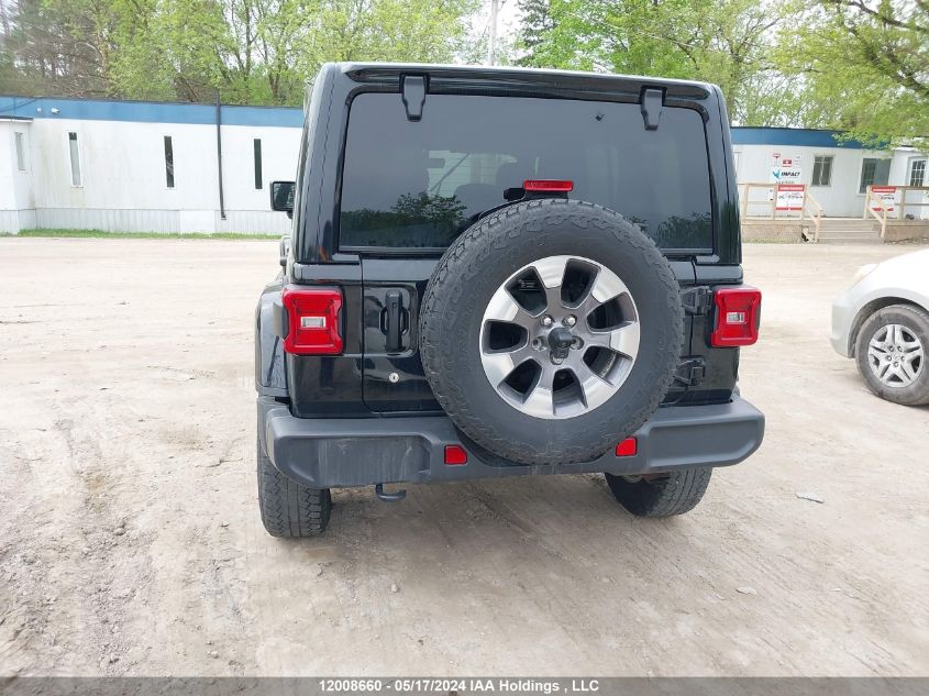 2019 Jeep Wrangler Unlimited Sahara VIN: 1C4HJXEN5KW522054 Lot: 12008660