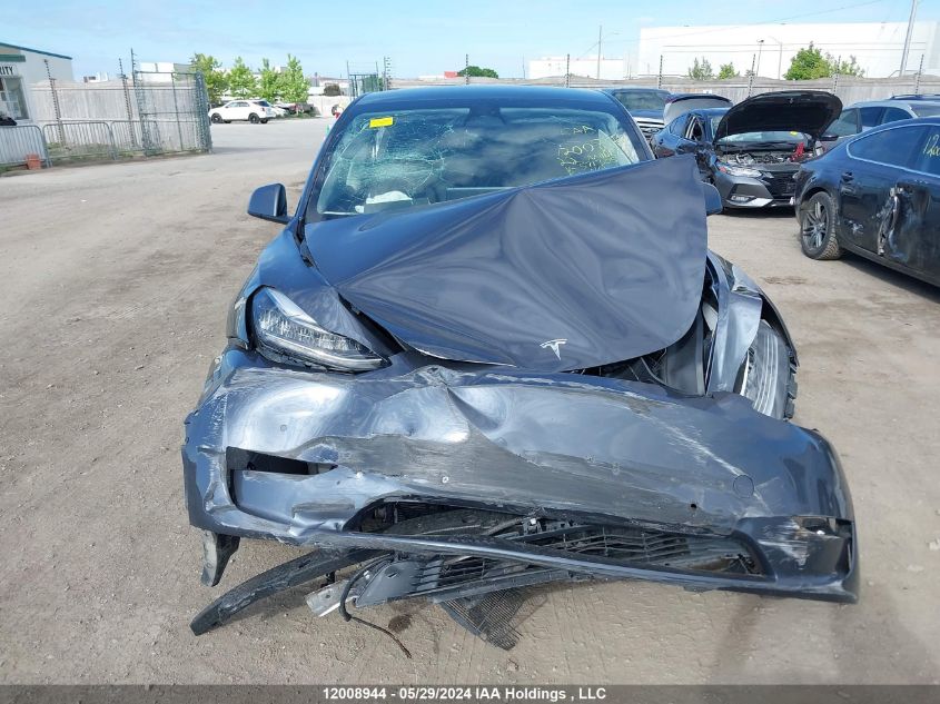 2022 Tesla Model Y VIN: 7SAYGDEE6NF571305 Lot: 12008944