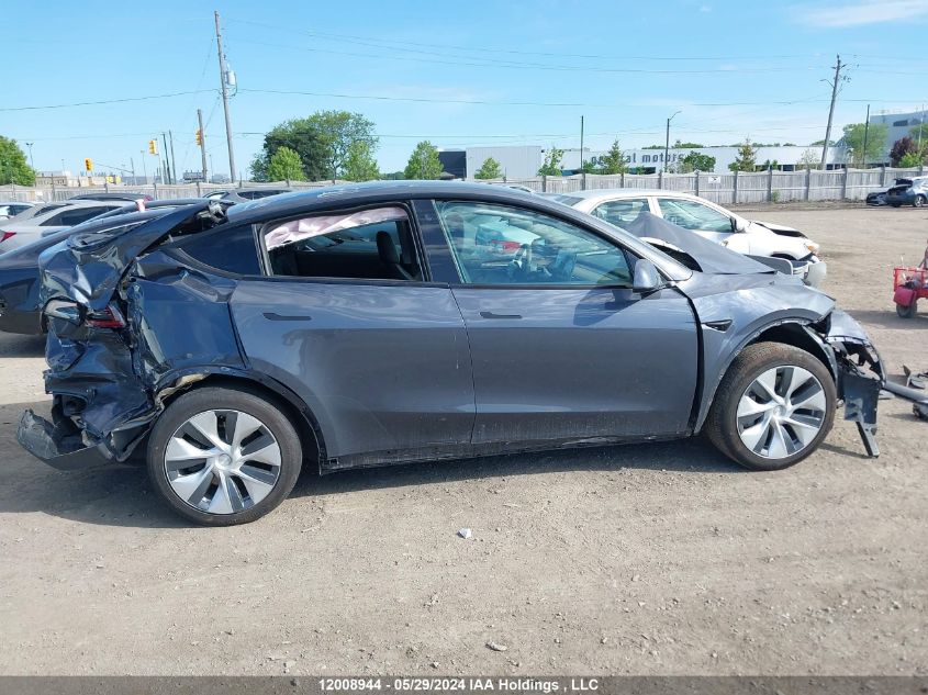 2022 Tesla Model Y VIN: 7SAYGDEE6NF571305 Lot: 12008944