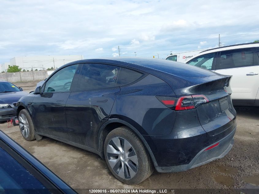 2024 Tesla Model Y VIN: 7SAYGDED0RF015021 Lot: 12009015