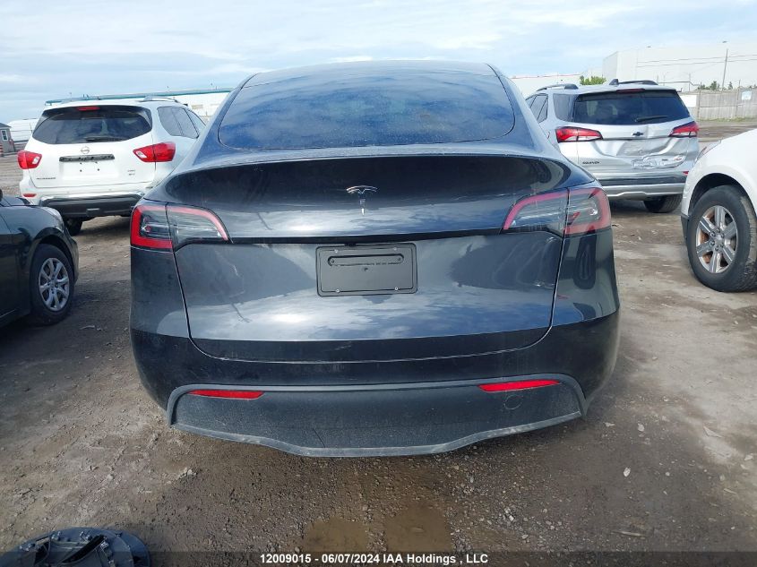 2024 Tesla Model Y VIN: 7SAYGDED0RF015021 Lot: 12009015