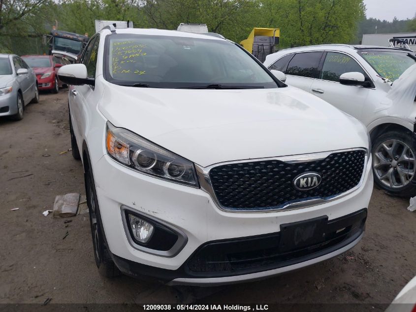 2016 Kia Sorento VIN: 5XYPHDA1XGG057669 Lot: 12009038