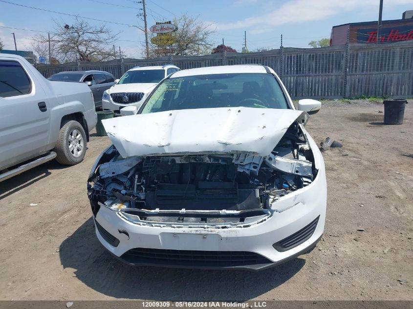 2017 Ford Focus Se VIN: 1FADP3F20HL329742 Lot: 12009309