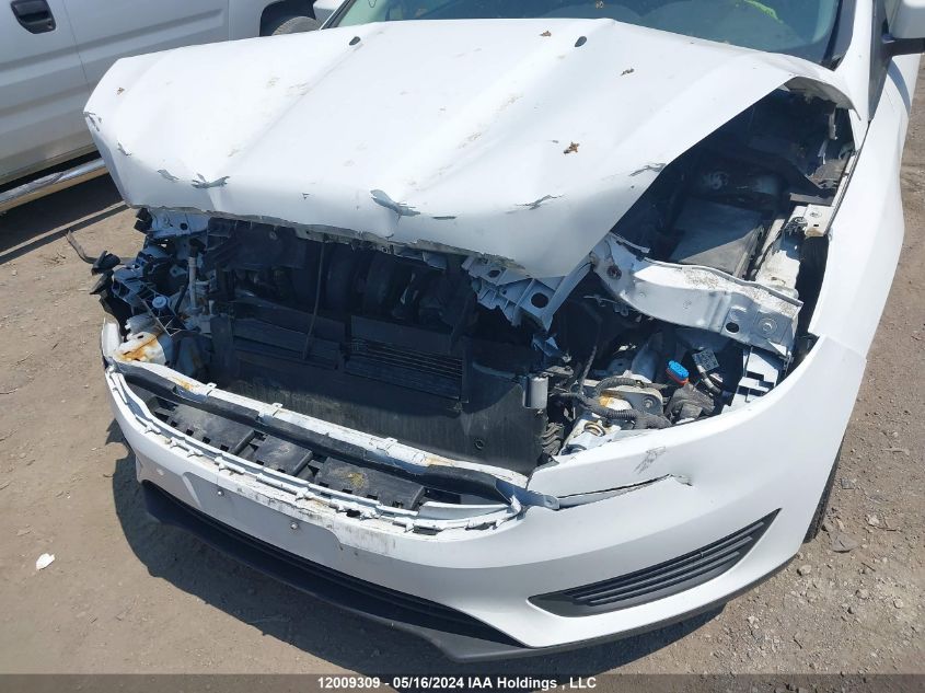 2017 Ford Focus Se VIN: 1FADP3F20HL329742 Lot: 12009309