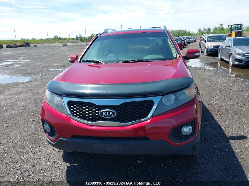 2011 Kia Sorento Ex VIN: 5XYKUDA29BG144275 Lot: 12009398