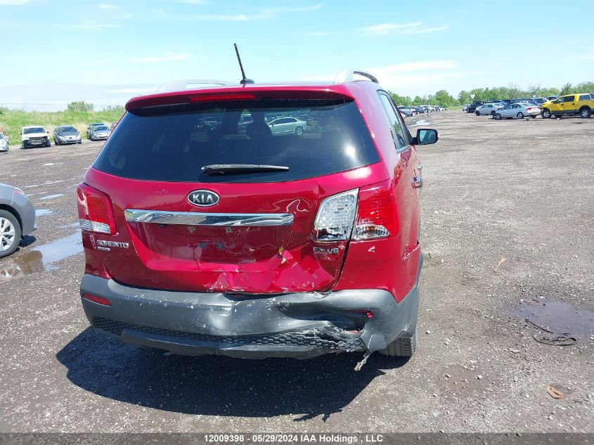 2011 Kia Sorento Ex VIN: 5XYKUDA29BG144275 Lot: 12009398