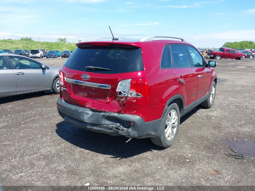 2011 Kia Sorento Ex VIN: 5XYKUDA29BG144275 Lot: 12009398