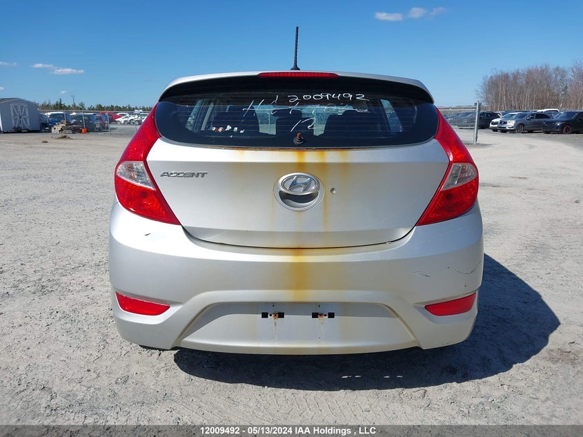 2012 Hyundai Accent L VIN: KMHCT5AEXCU033320 Lot: 12009492