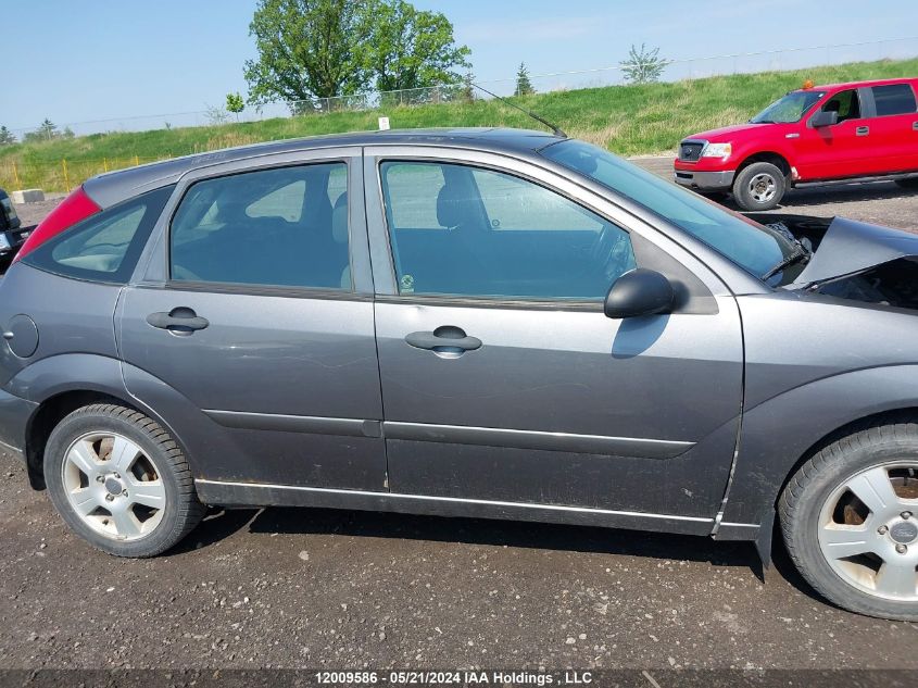 2007 Ford Focus Zx5/S/Se/Ses VIN: 1FAFP37N07W152799 Lot: 12009586