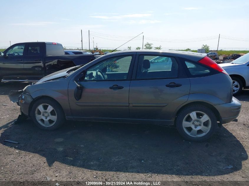 2007 Ford Focus Zx5/S/Se/Ses VIN: 1FAFP37N07W152799 Lot: 12009586