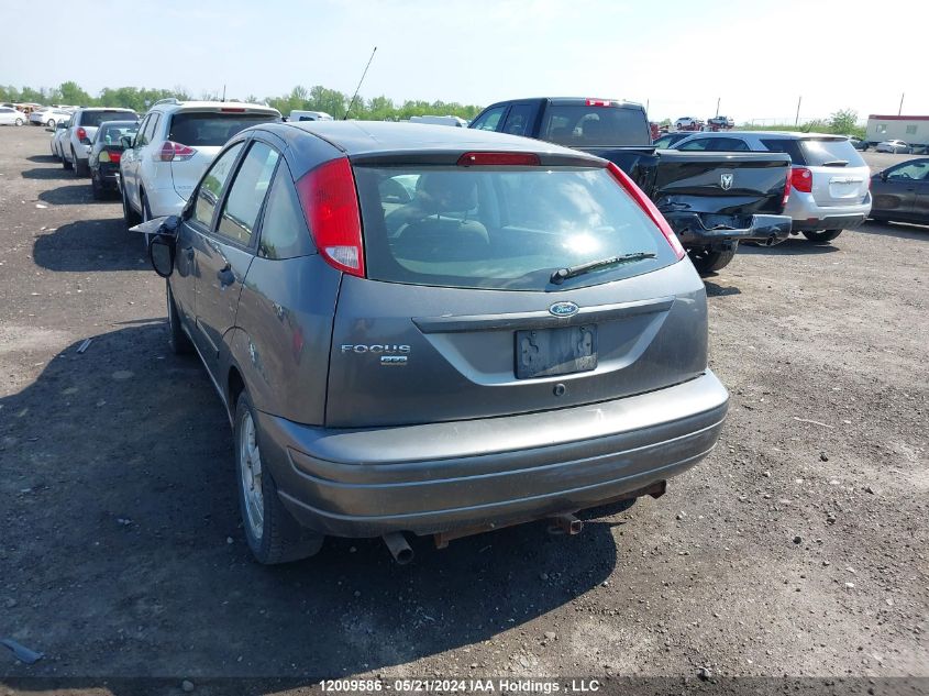 2007 Ford Focus Zx5/S/Se/Ses VIN: 1FAFP37N07W152799 Lot: 12009586