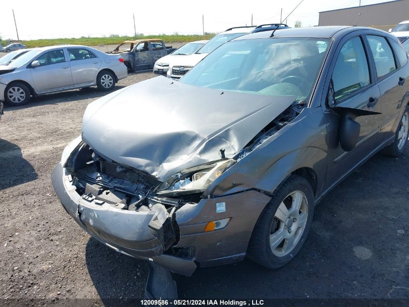 2007 Ford Focus Zx5/S/Se/Ses VIN: 1FAFP37N07W152799 Lot: 12009586