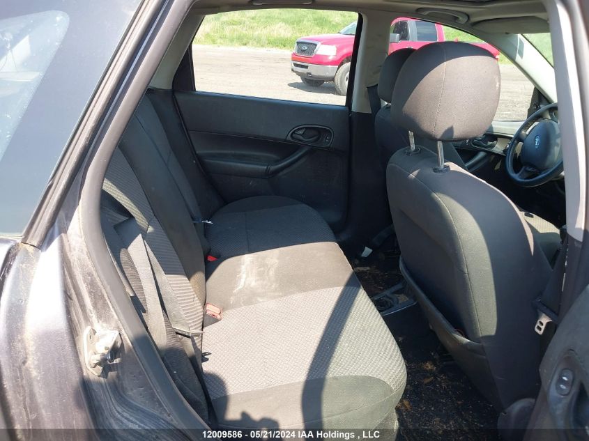 2007 Ford Focus Zx5/S/Se/Ses VIN: 1FAFP37N07W152799 Lot: 12009586