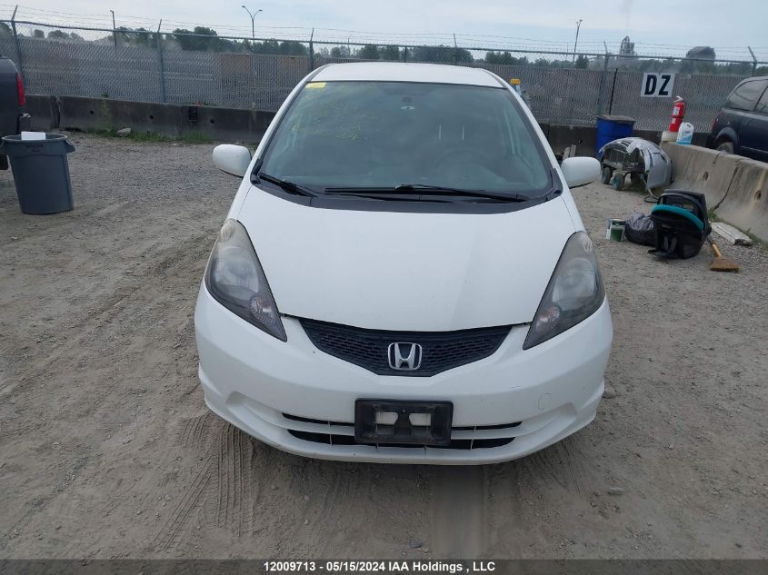 2009 Honda Fit VIN: JHMGE88589S813214 Lot: 12009713