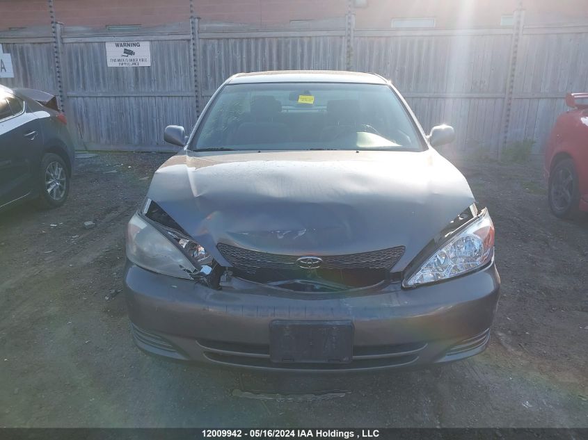 2003 Toyota Camry Le/Xle VIN: JTDBF32K130144006 Lot: 12009942