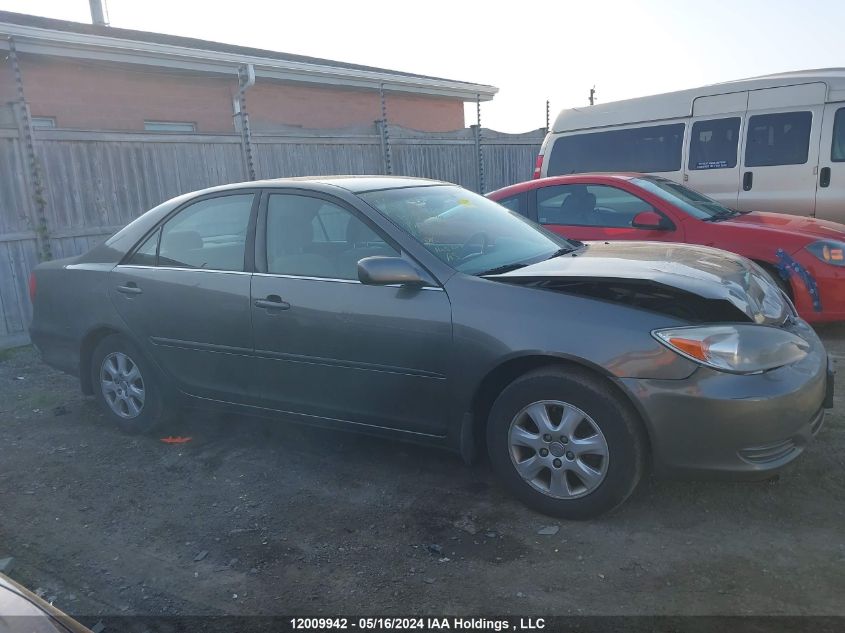 2003 Toyota Camry Le/Xle VIN: JTDBF32K130144006 Lot: 12009942