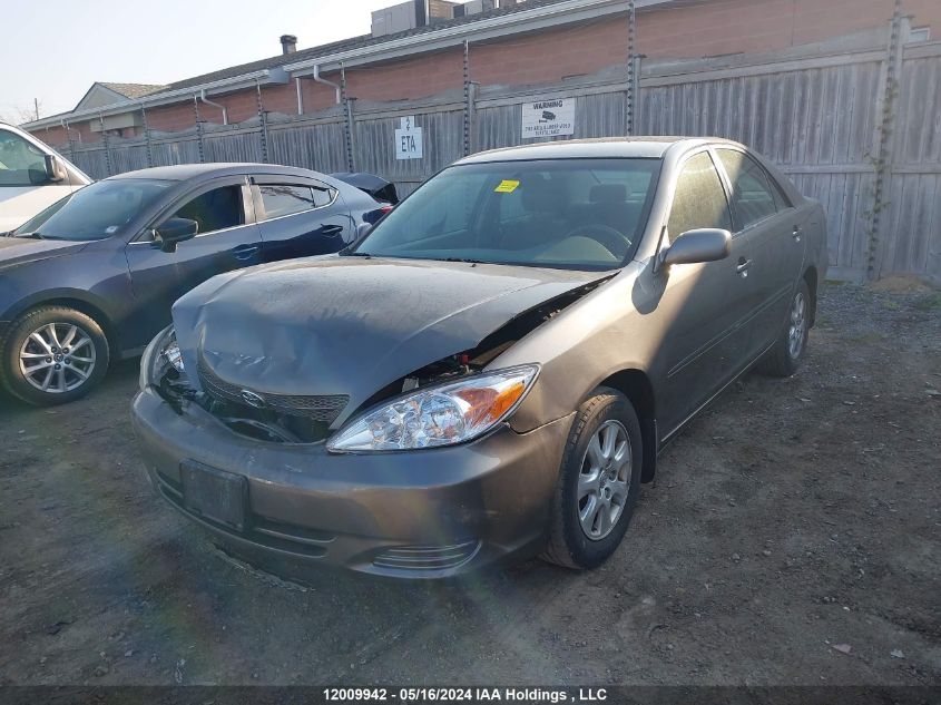 2003 Toyota Camry Le/Xle VIN: JTDBF32K130144006 Lot: 12009942