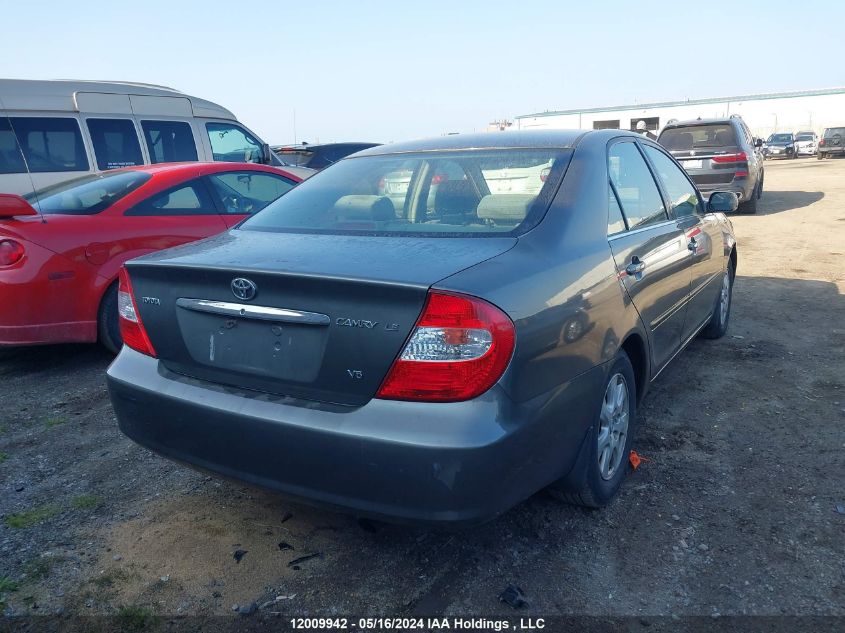 2003 Toyota Camry Le/Xle VIN: JTDBF32K130144006 Lot: 12009942