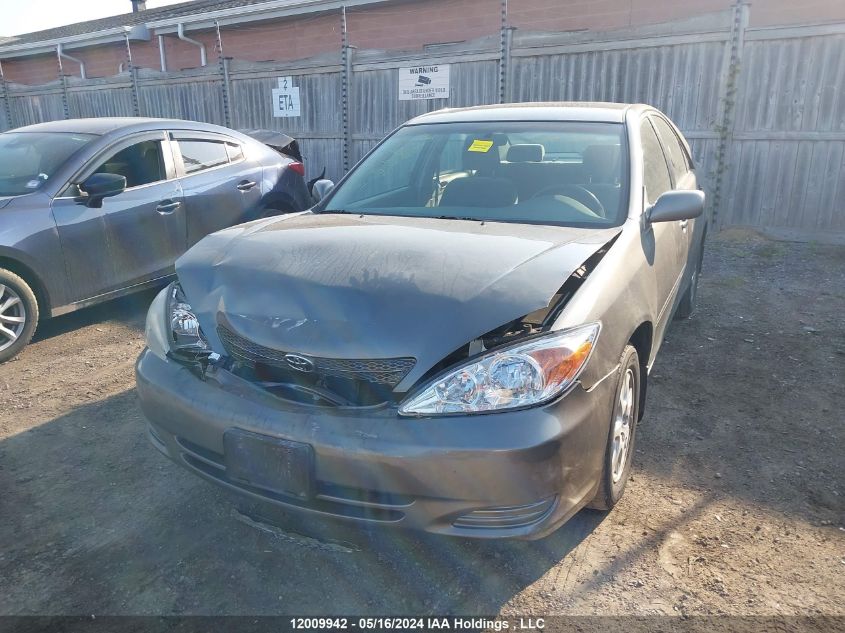 2003 Toyota Camry Le/Xle VIN: JTDBF32K130144006 Lot: 12009942