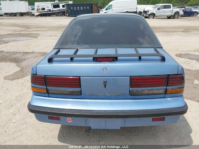 1989 Pontiac Sunbird Se VIN: 1G2JD11K0K7633014 Lot: 12010127