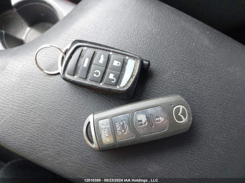 2015 Mazda Mazda3 VIN: 3MZBM1V7XFM214604 Lot: 12010388