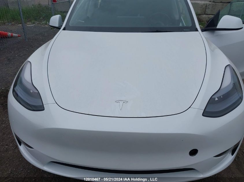 2023 Tesla Model Y VIN: LRWYGDFD7PC966657 Lot: 12010467