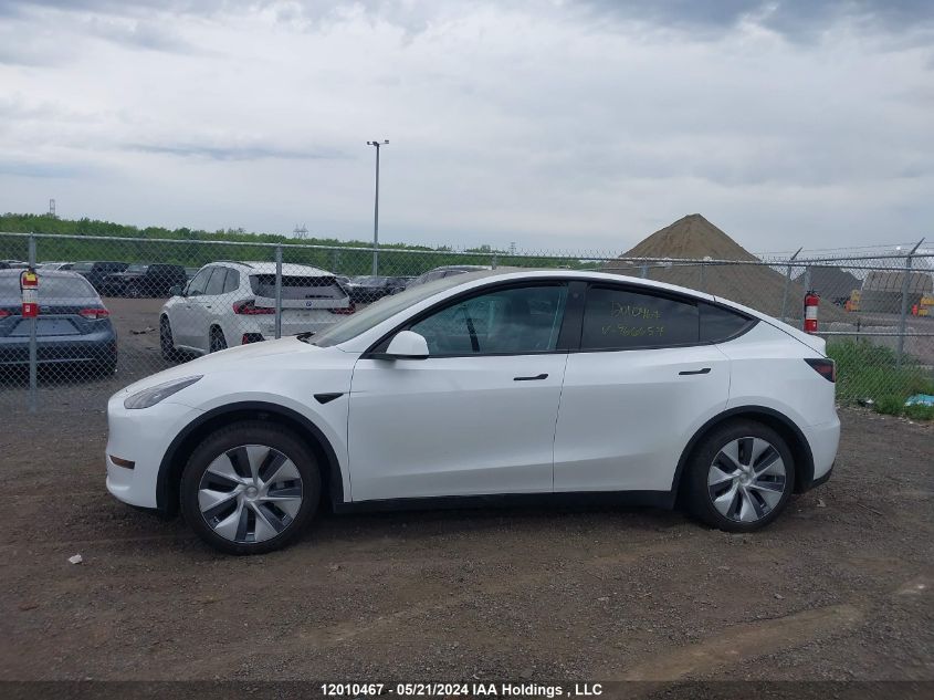 2023 Tesla Model Y VIN: LRWYGDFD7PC966657 Lot: 12010467