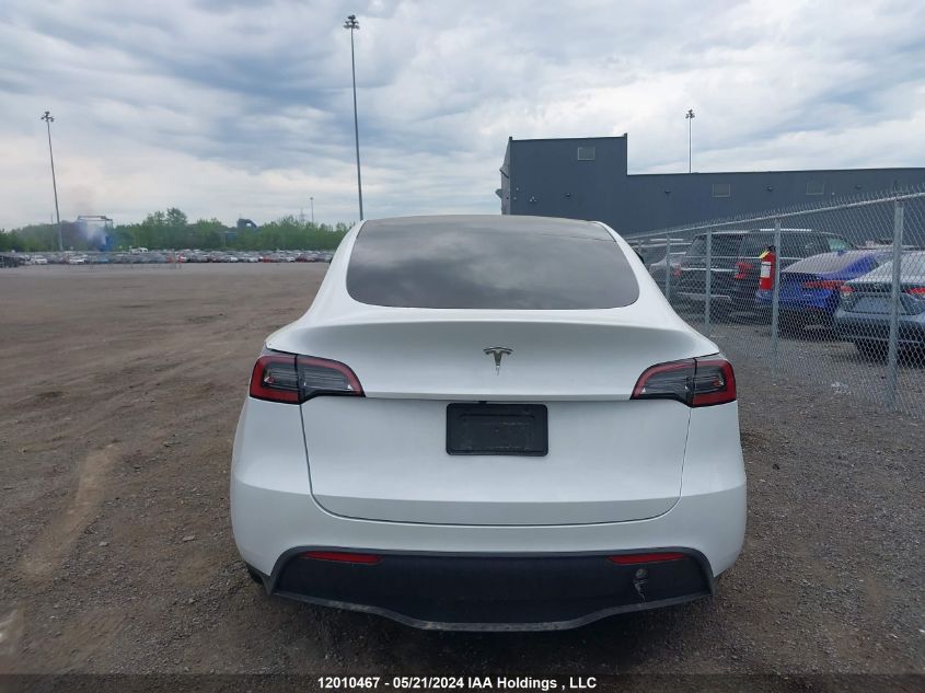 2023 Tesla Model Y VIN: LRWYGDFD7PC966657 Lot: 12010467