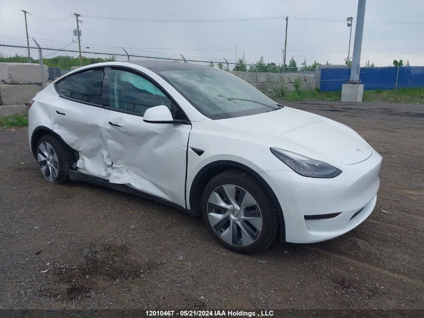 2023 Tesla Model Y VIN: LRWYGDFD7PC966657 Lot: 12010467