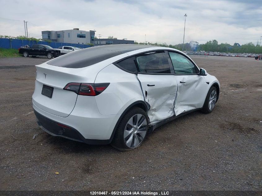 2023 Tesla Model Y VIN: LRWYGDFD7PC966657 Lot: 12010467