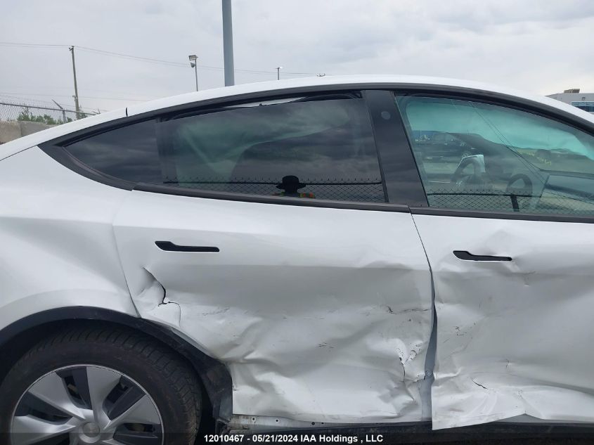 2023 Tesla Model Y VIN: LRWYGDFD7PC966657 Lot: 12010467