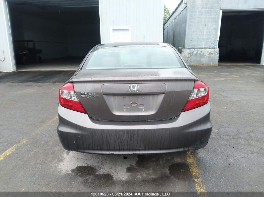 2012 Honda Civic Lx VIN: 2HGFB2F40CH061148 Lot: 12010523