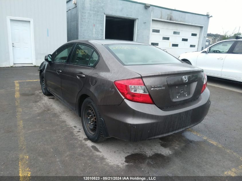 2012 Honda Civic Lx VIN: 2HGFB2F40CH061148 Lot: 12010523