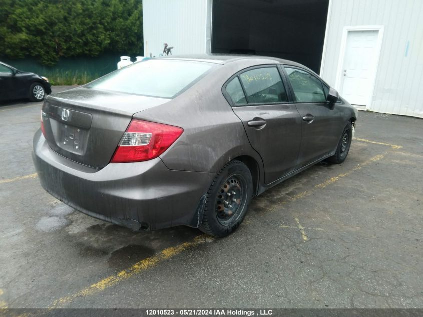 2012 Honda Civic Lx VIN: 2HGFB2F40CH061148 Lot: 12010523