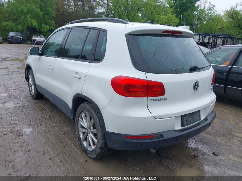 2014 Volkswagen Tiguan VIN: WVGJV3AX5EW607174 Lot: 12010581