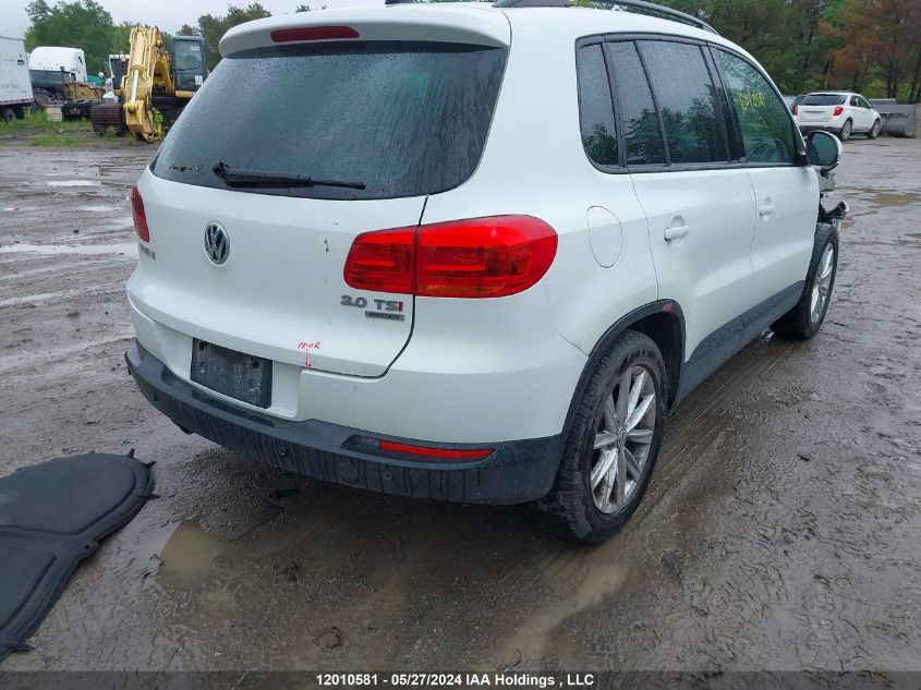 2014 Volkswagen Tiguan VIN: WVGJV3AX5EW607174 Lot: 12010581