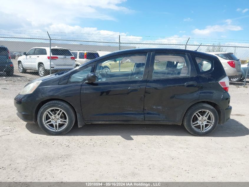 2009 Honda Fit VIN: JHMGE87349S809659 Lot: 12010594