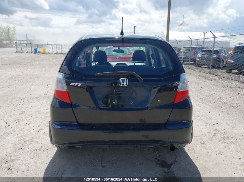 2009 Honda Fit VIN: JHMGE87349S809659 Lot: 12010594